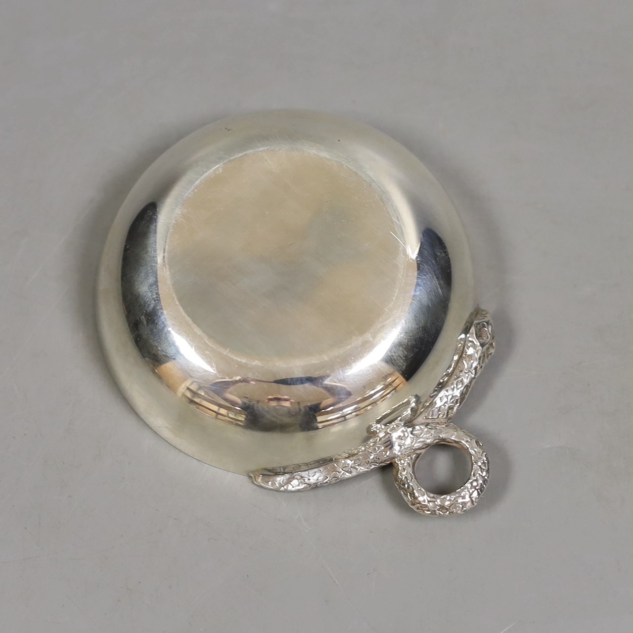 A modern silver taste du vin, with serpent handle, Cooper Brothers & Sons, Sheffield, 1973, 10.2cm, 83 grams.